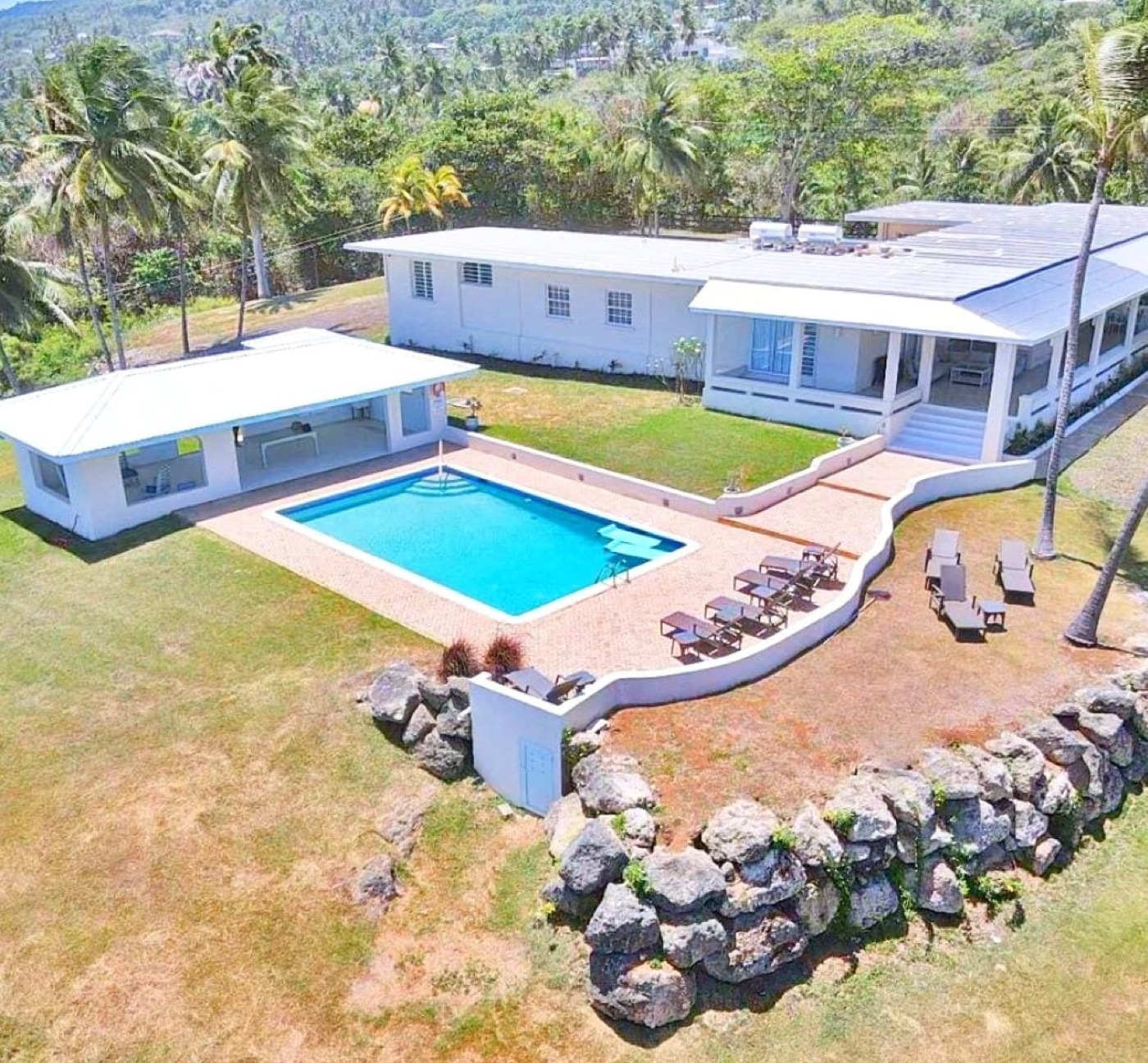 Aerial view of Cornwall House beside the Atlantic coastline