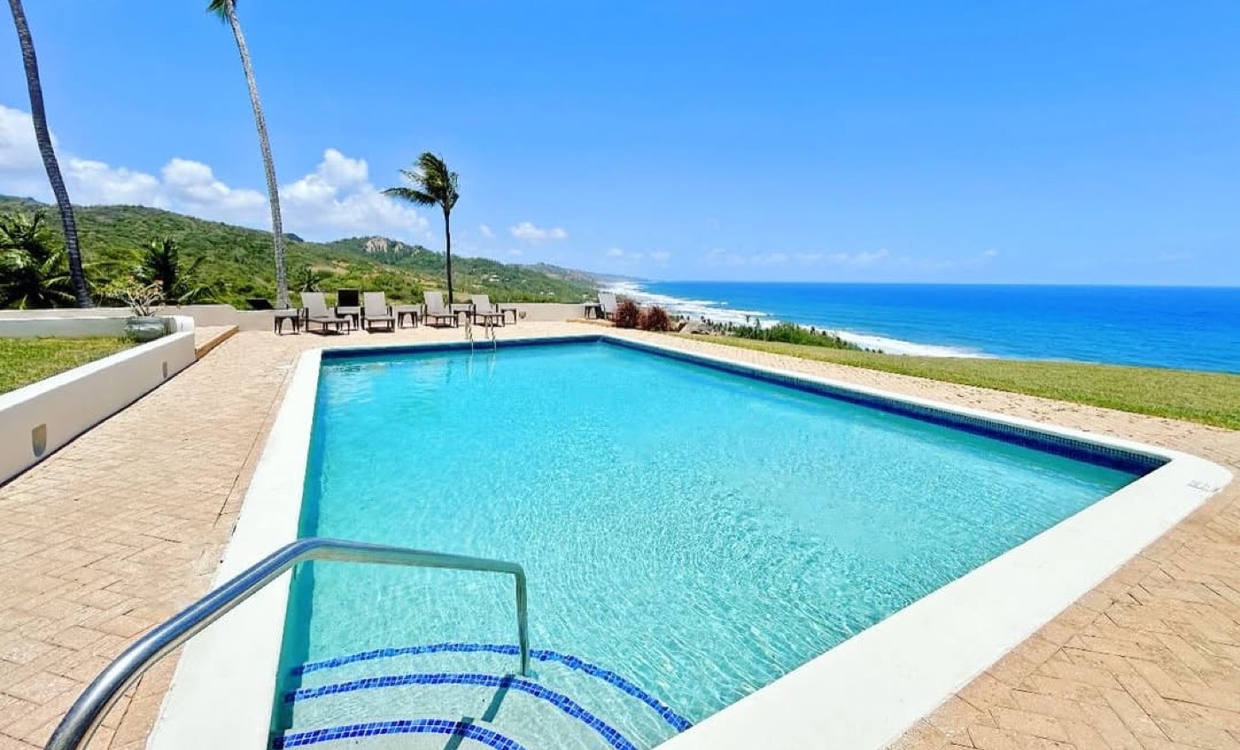 Private swimming pool with the Atlantic beyond